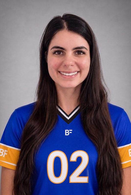 Maria, sales at Brook Frameworks, in a blue BF team jersey with the number 02
